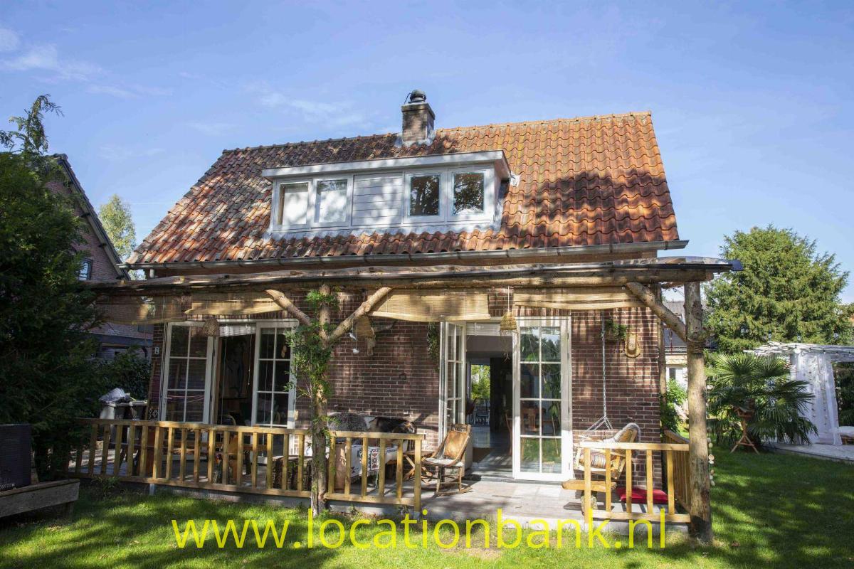 Huis met veranda voorkant