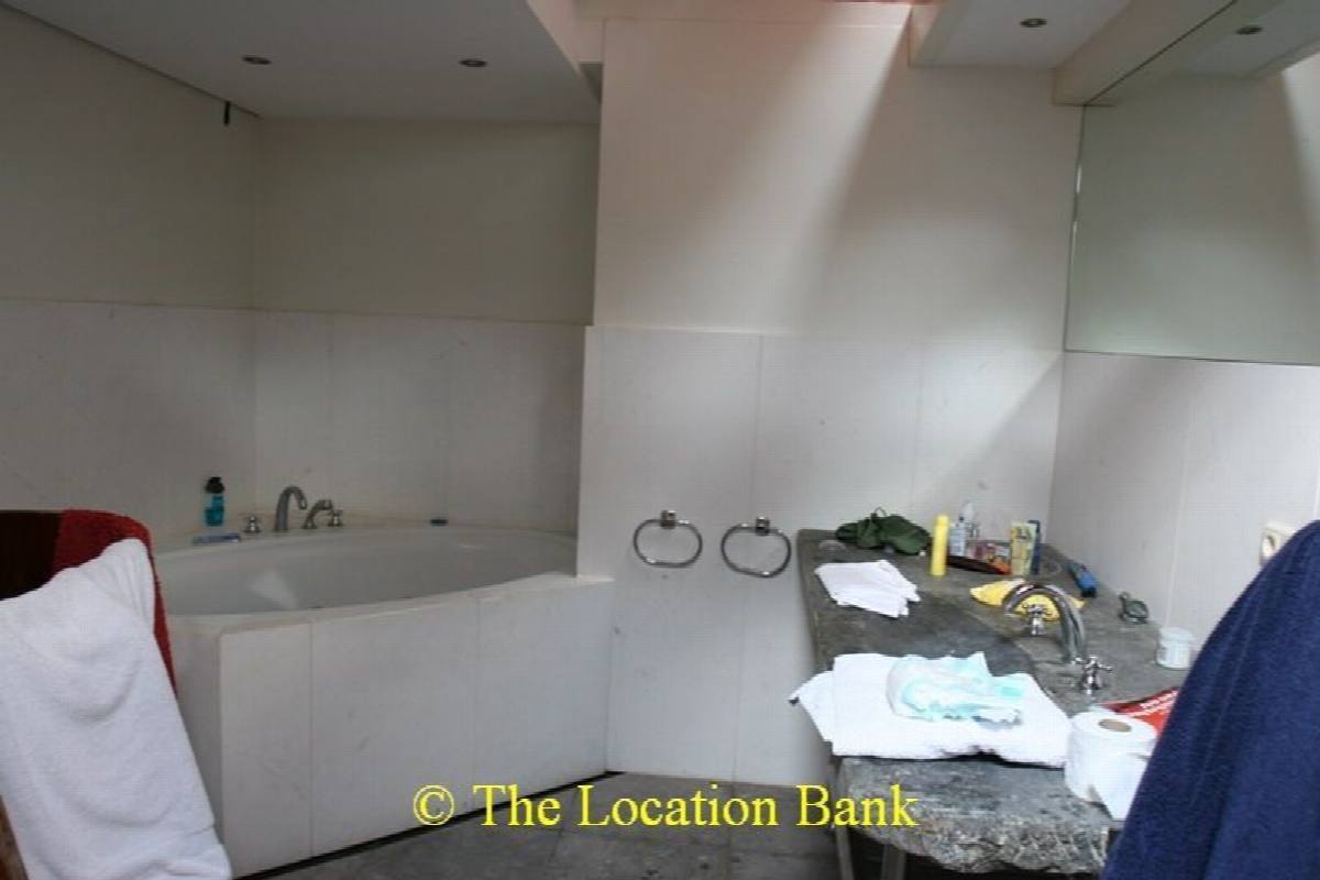 Badkamer met dompelbad