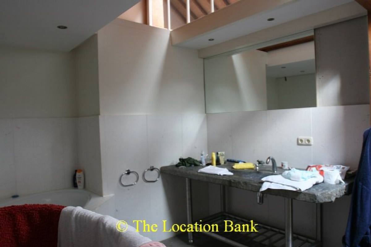 Badkamer met dompelbad