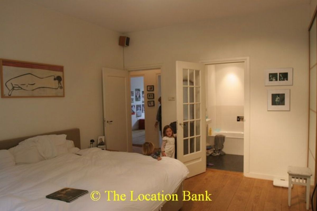 Slaapkamer met aangrenzende badkamer