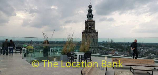 filmlocatie Modern Gebouw Architectuur roltrappen dakterras skyline