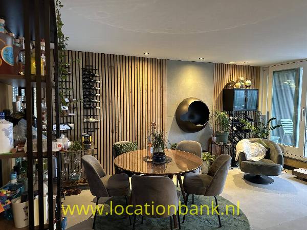 filmlocatie Appartement met ruim dakterras en open haard en uitzicht.