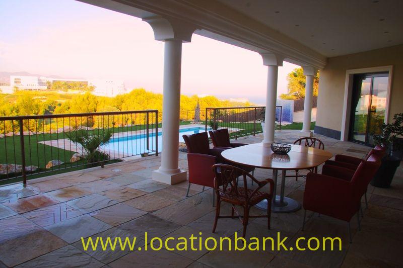 Terrace with view at the pool