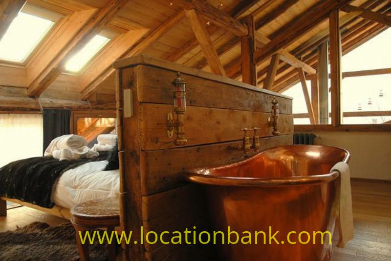 bedroom with copper bathtub