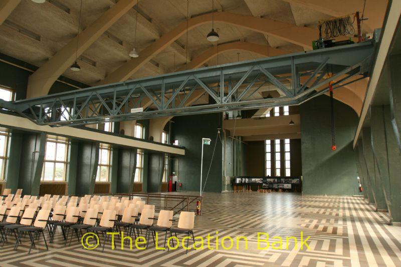 Industrial Hall with dark green walls