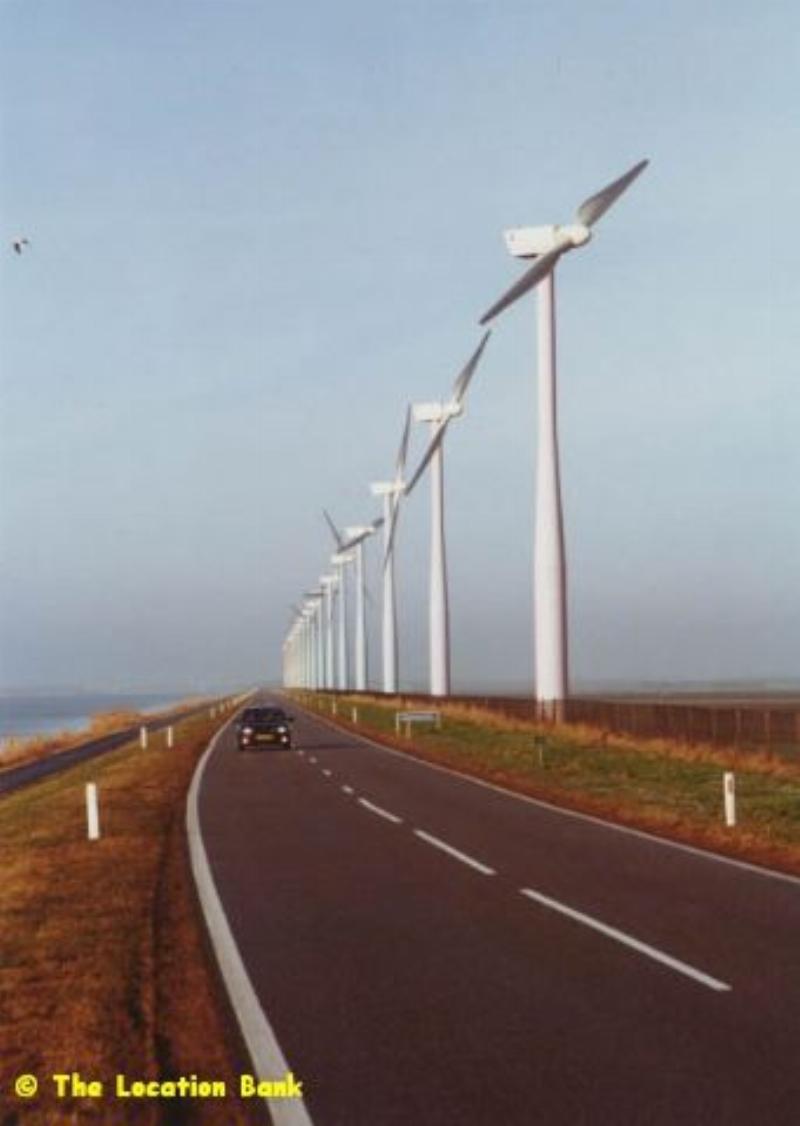 Road with modern windmills