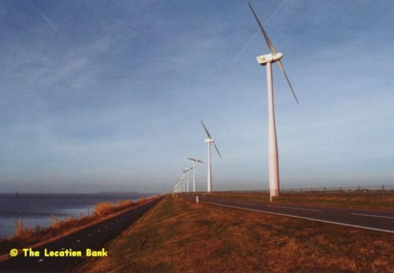 Road with modern windmills