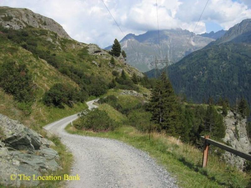 Dirt road in the mountains. Valley road