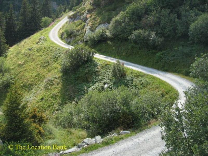 Dirt road in the mountains. Valley road