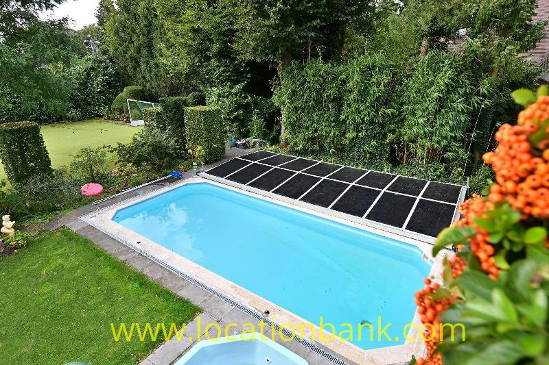private pool with solar panels