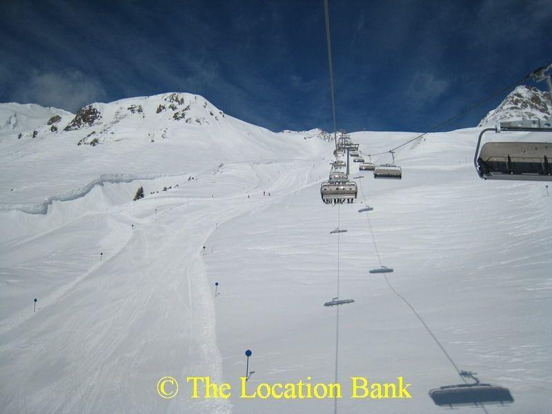 Ski run and ski lift in the mountains