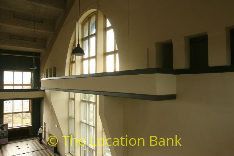 Large window seen from Balkon in industrial hall