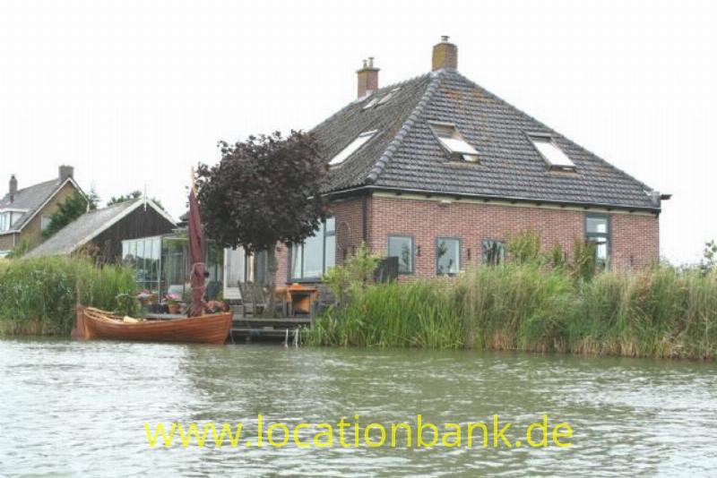 farmhouse at the water