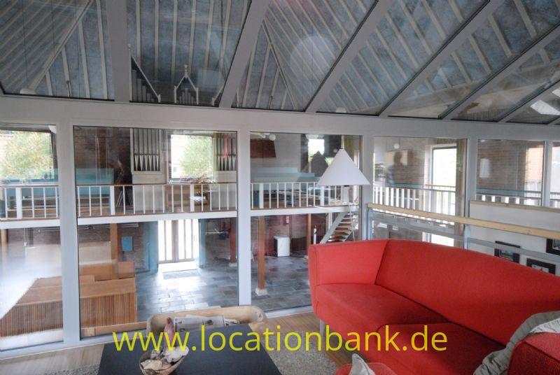 Wohnzimmer space in modern Dachboden in ehemaligen church