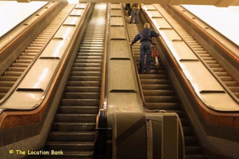 Wooden escalator in mall.
