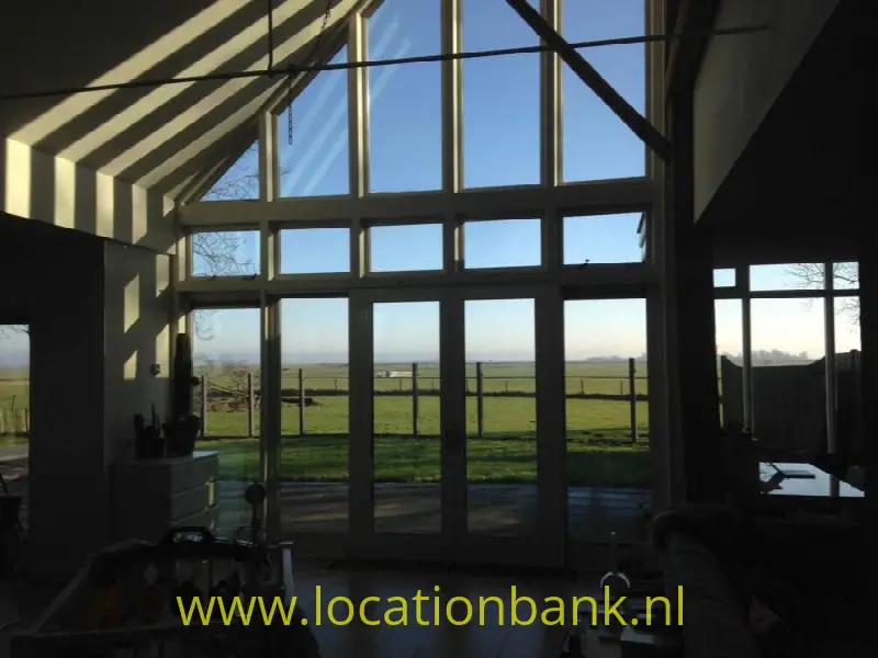 Huis in het weiland