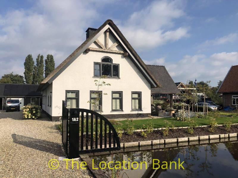 woonboerderij aan het water