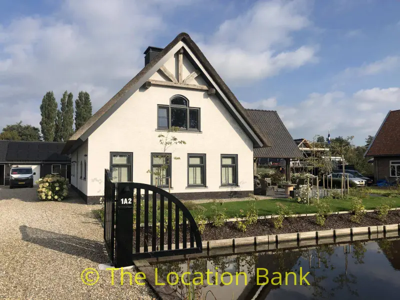 woonboerderij aan het water