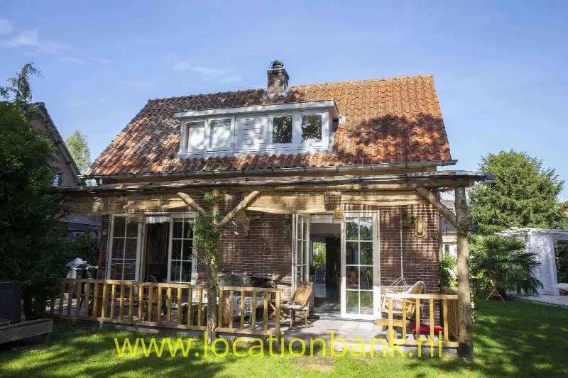 Huis met veranda voorkant