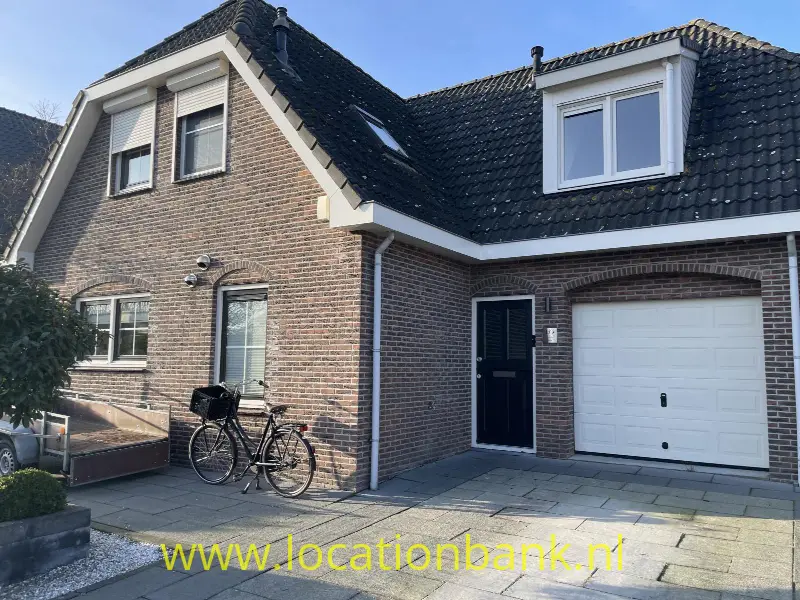 huis met Prive Garage 