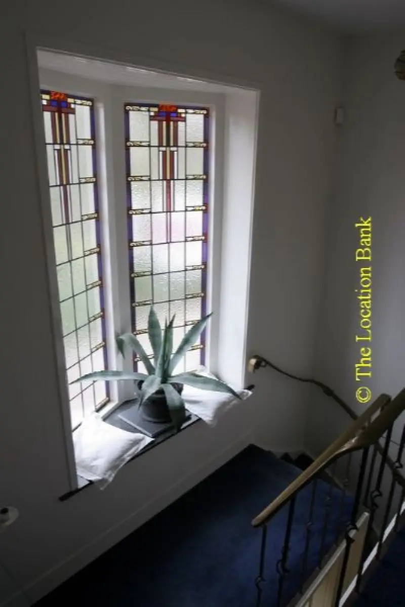 Trap met glas in lood raam