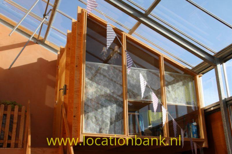 Huis in glazen kas 