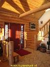 Front door of wooden cottage