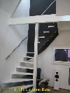 Spiral staircase in modern Dachboden