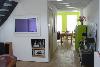 woonkamer in verbinding met open keuken