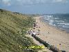 strand met zeer hoge duinen